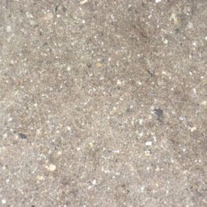 A close up of the sand on the ground