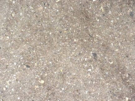 A close up of the sand on the ground